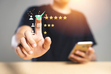 Customer hand touching to yellow illustration 5 stars virtual screening monitor satisfaction