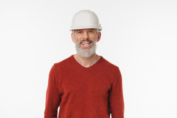 Positive confident caucasian mature middle-aged man engineer construction worker builder in white hardhat looking at camera isolated in white background