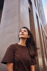 Young expertise businesswoman standing on street