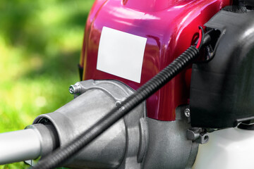 Petrol trimmer motor, rod close up