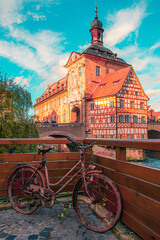 Bamberg Rathaus landmark building with a rusty bicycle in front of it.