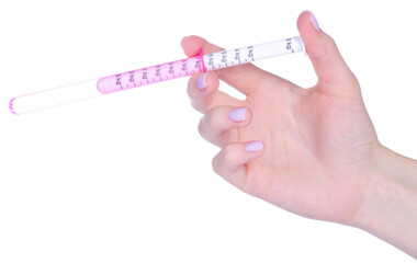 syringe for child syrup in hand on white background isolation