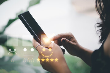 Customer service and Satisfaction concept Men's hands doing online assessments in the satisfaction...