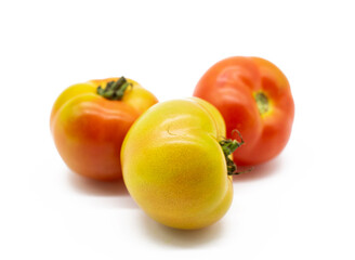 fresh organic tomatoes isolated on white background