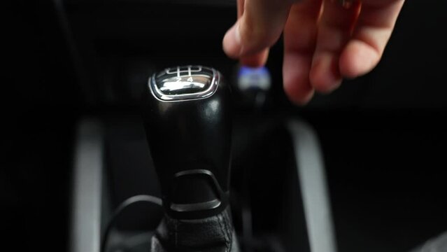Hand Shifting Gears on Manual Gearbox Car, Isolated Action