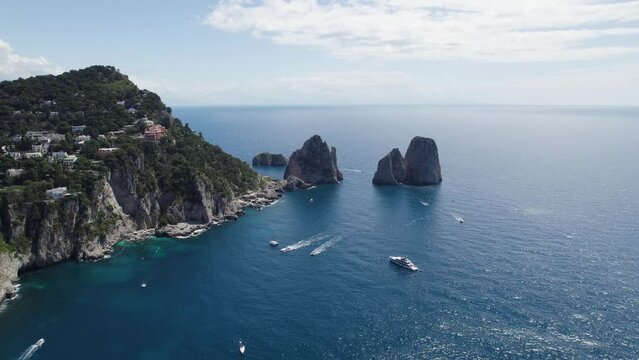Scenic Drone Shot Of Capri Faraglioni Rocks In Blue Sea Water