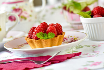 raspberry tart cake on a table