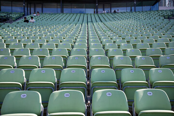 Empty Plastic Chairs at the Stadium