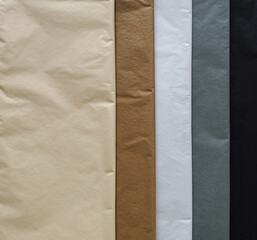 Tissue wrapping paper color palette. Black, grey, white, kraft and beige.