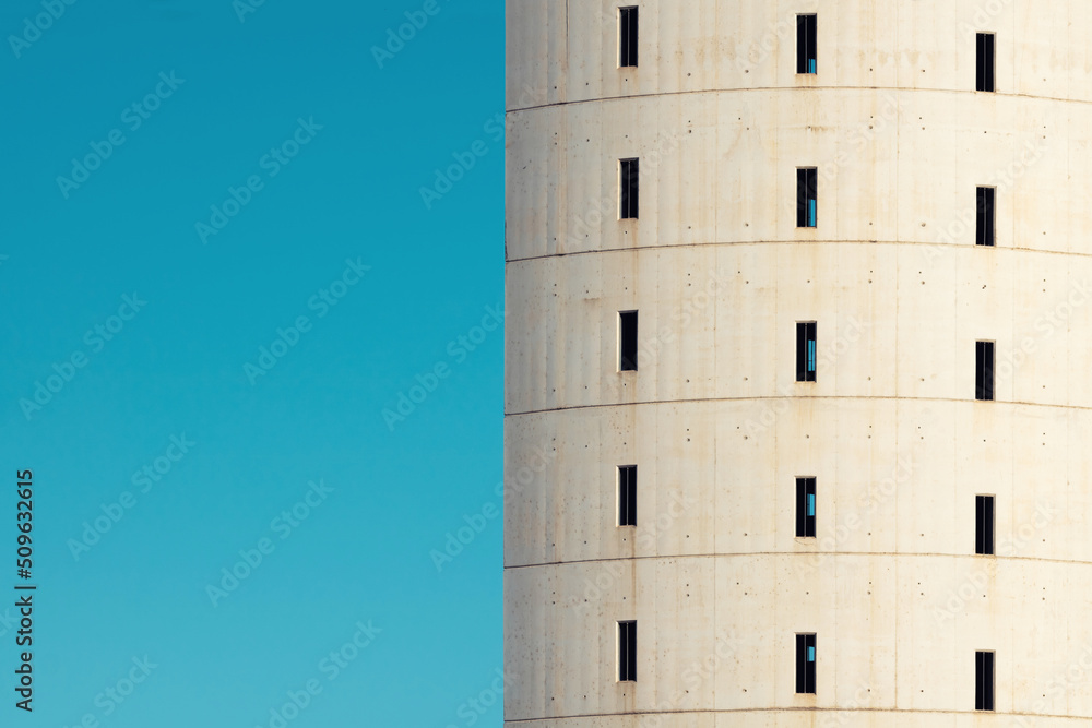 Poster abstract architecture. close up of water tower against clear sky.