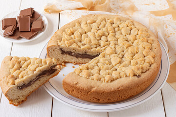 Shortbread pie with chocolate filling and pieces of chocolate
