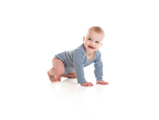 Cheerful baby boy toddler on white studio background