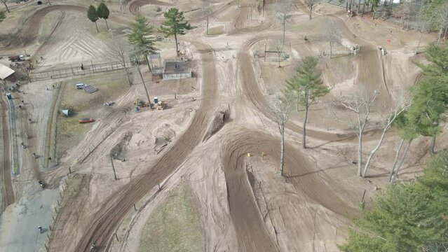 dirtbike track wide shot flyover 4k 60p