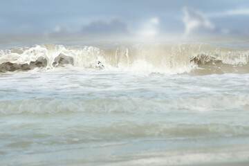 Splashing sea waves on sunny day.Summer vacation background.