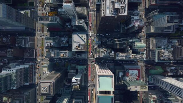 Aerial birds eye overhead top down view of block structure of city. Buildings are arranged into blocks divided by streets. Manhattan, New York City, USA