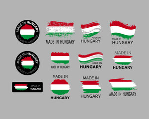 Set of stickers. Made in Hungary. Brush strokes shaped with Hungarian flag. Factory, manufacturing and production country concept. Design element for label and packaging. Vector colorful illustration.