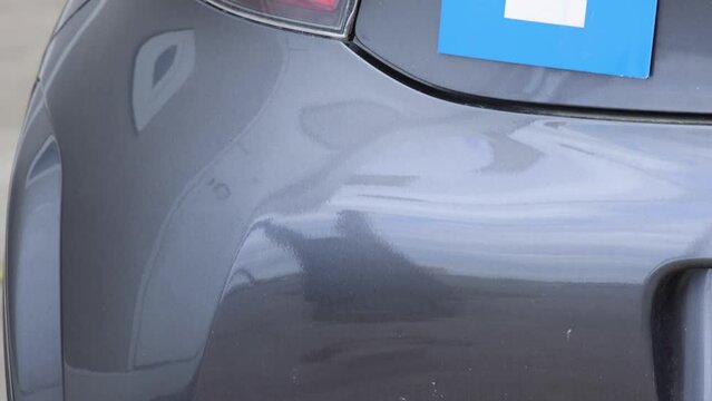 New Driver Learner Blue Plate Sticker at City Car tilt up