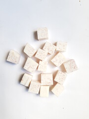 Taro slices and cube was cuted for cooking new dishes  on white and wood background.