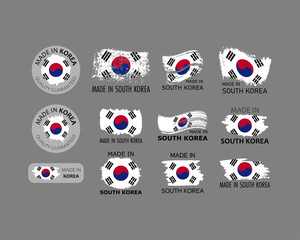 Set of stickers. Made in South Korea. Brush strokes shaped with Korean flag. Factory, manufacturing and production country concept. Design element for label and packaging. Vector illustration.