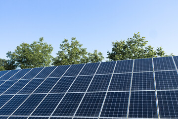 Solar panels (solar cell) in solar farm with sun lighting to create the clean electric power