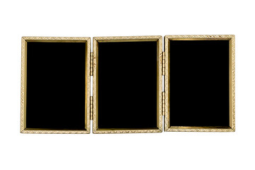 Old hinged triple picture frame close-up isolated on white background