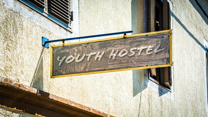 Obraz premium Street Sign to Youth Hostel