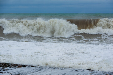 Stormy sea waves breaking near the coast