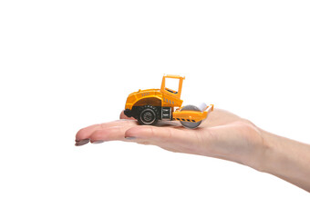 Paver model on the palm of the hand isolated on white background