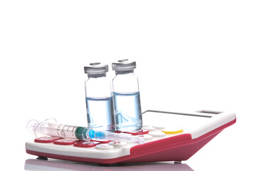 Syringe with vaccine bottle and calculator isolated on white background with reflection. Vaccination