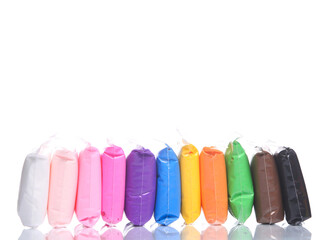 Air plasticine mass for modeling colored ultralight plasticine isolated on white background.