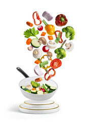 Fresh vegetables falling onto a griddle to be cooked