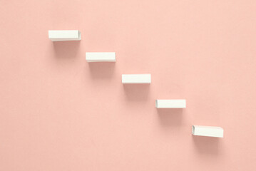 White steps on a pink background. Minimalism. Leadership, career development