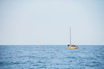 Naklejka premium Ship at sea. Yacht in the sea. Recreation on the water