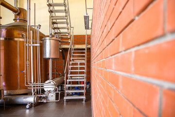 Wine steel tanks, equipment of contemporary winemaker factory.  Barrels for wine storage.