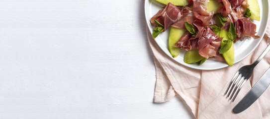 Fresh serrano ham salad with cantaloupe melon