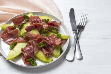 Fresh serrano ham salad with cantaloupe melon