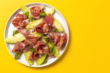 Fresh serrano ham salad with cantaloupe melon