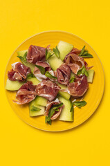 Fresh serrano ham salad with cantaloupe melon