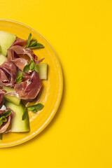 Fresh serrano ham salad with cantaloupe melon