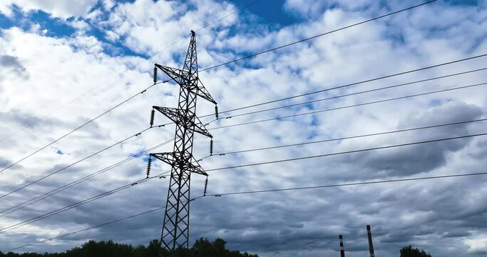 Power line pylon against the background of the sky. Aerial view
