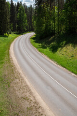Path and road near the river and forest