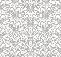 Wallpaper in the style of Baroque. Seamless vector background. White and gray floral ornament. Graphic pattern for fabric, wallpaper, packaging. Ornate Damask flower ornament.