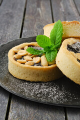 Caramel tart with peanut and mint