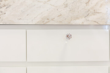 Drawer handle made of crystal. Luxurious furniture.