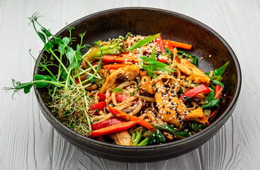 Asian dish, noodles with chicken and vegetables