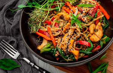 Asian dish, noodles with chicken and vegetables