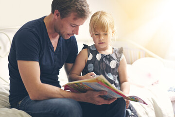 Hes always there for her. Shot of a single dad helping his daughter with her homework.