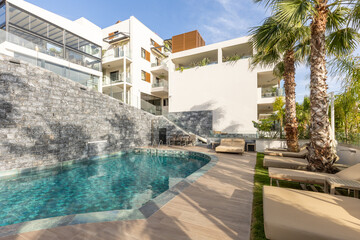 Sea hotel resort with swimming pool in the morning