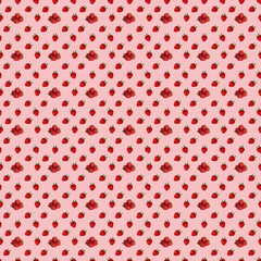 Seamless pattern with strawberries on a pink background.
