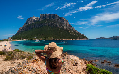 Woman enjoying the panorama of the protected marine area of the island of Tavolara, municipality of...
